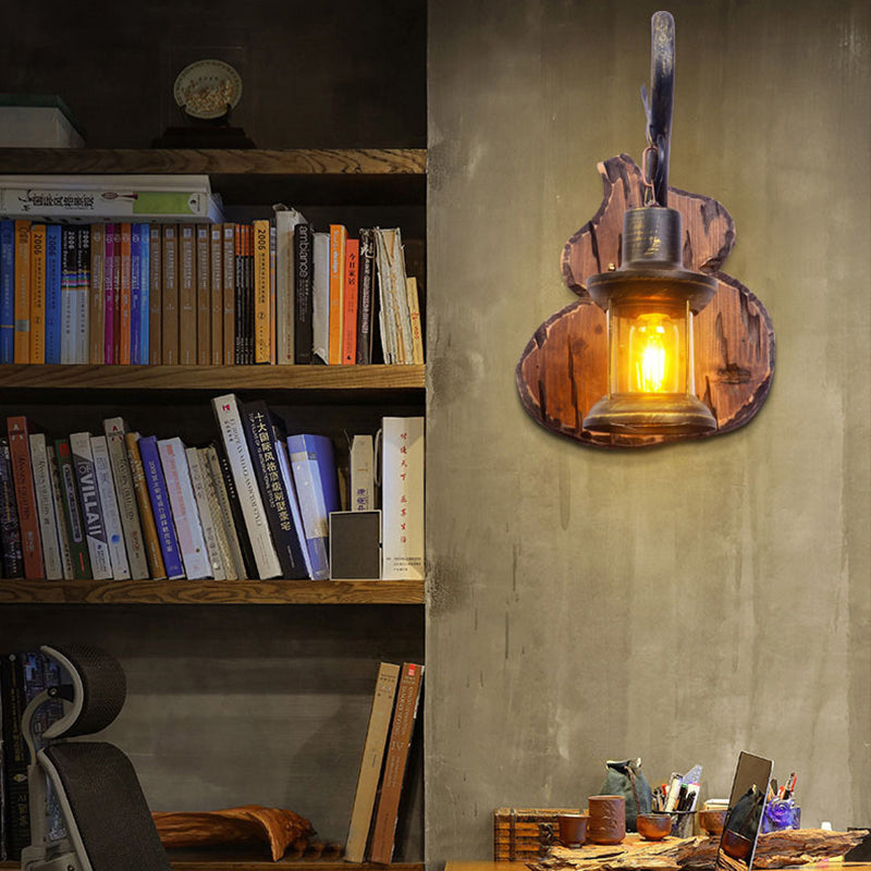 BowLift | Coastal Lantern Wall Lighting Fixture 1 Lamp Clear Glass Wall Light in Antique Brass with Gourd Back Plate