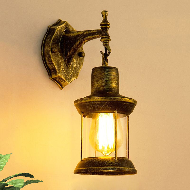 BowLift | An E27 wall light with a petroleum shade made of clear glass Traditional outdoor wall light in antique bronze