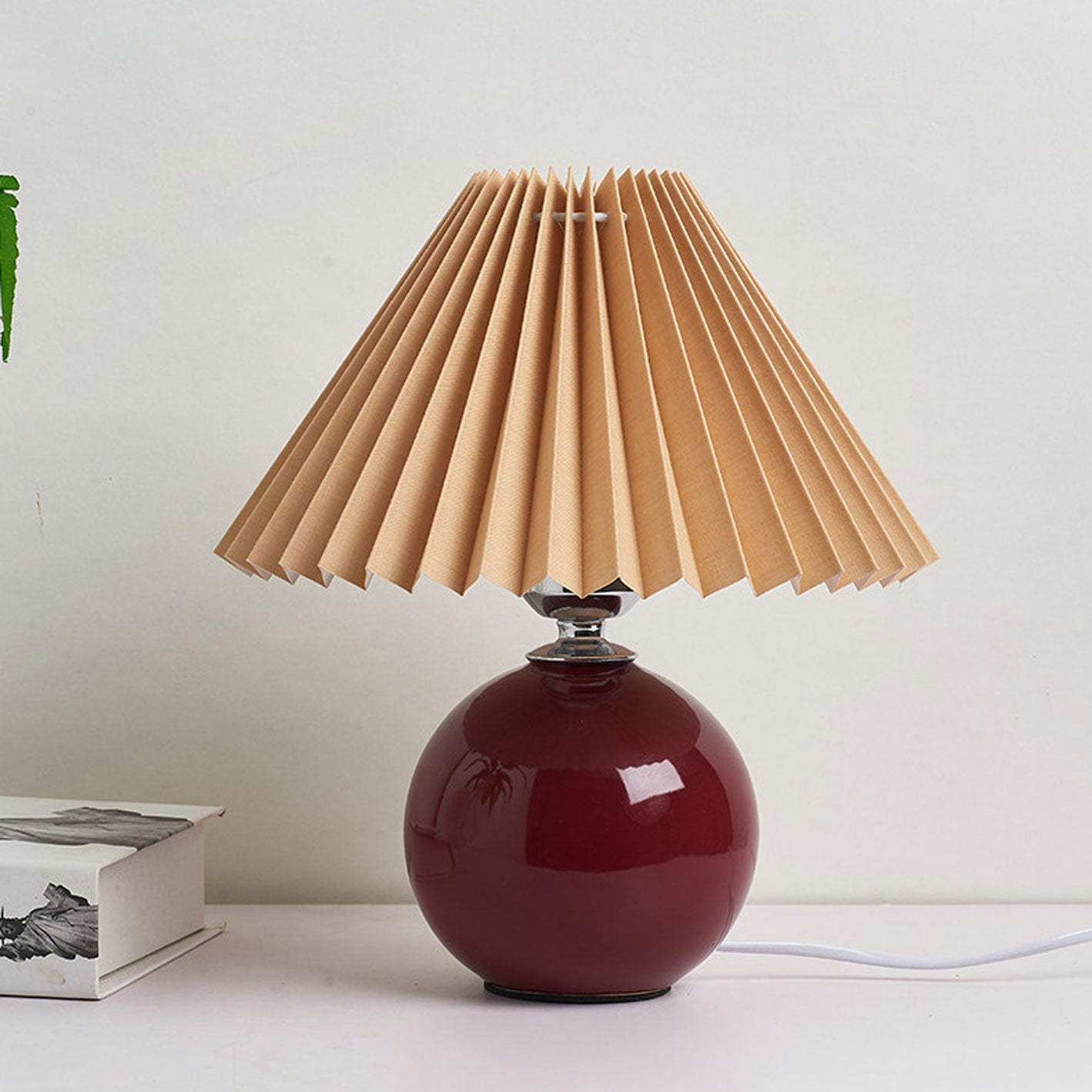 BowLift | Nordic minimalist 1-light table lamp made of ceramic with pleats