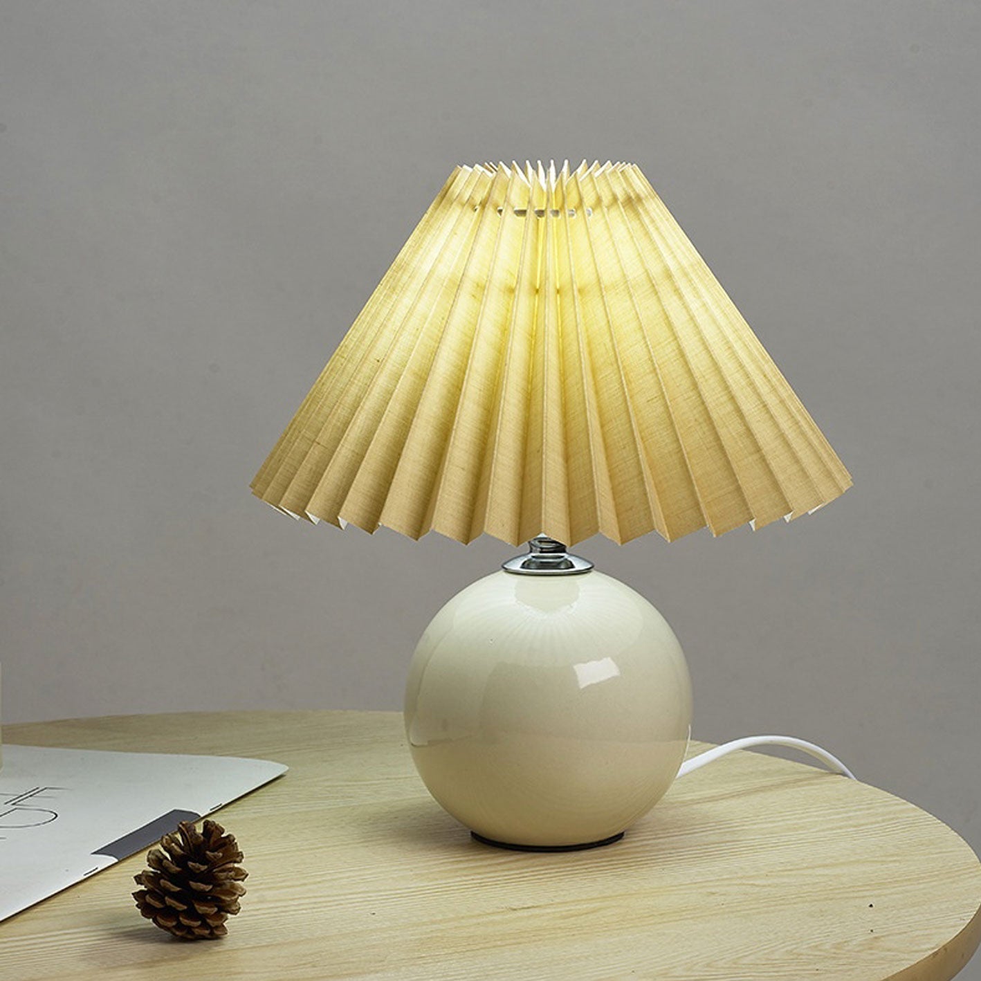 BowLift | Nordic minimalist 1-light table lamp made of ceramic with pleats