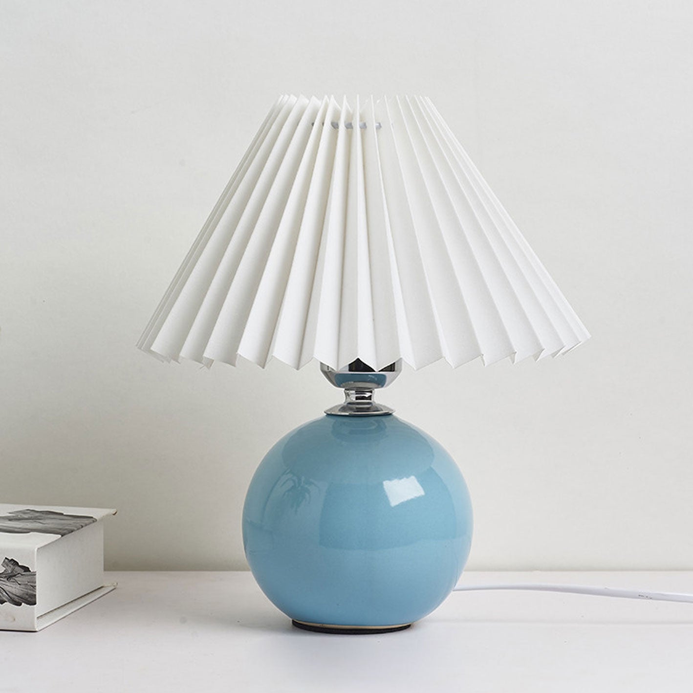 BowLift | Nordic minimalist 1-light table lamp made of ceramic with pleats