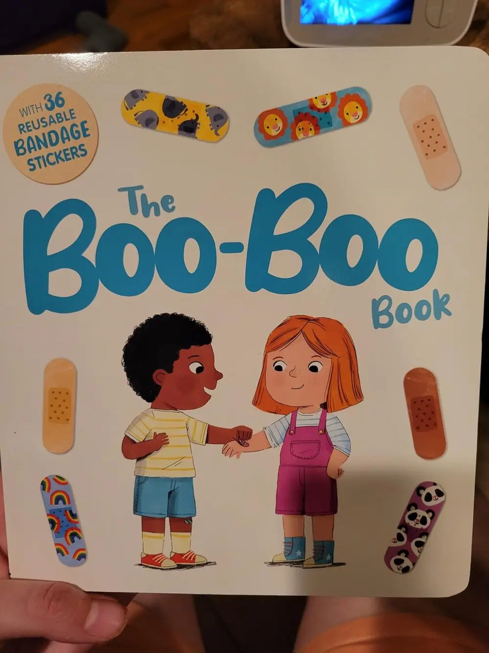 BowLift | The "Ouch Book" – Interactive Picture Book with 36 Reusable Band-Aid Stickers