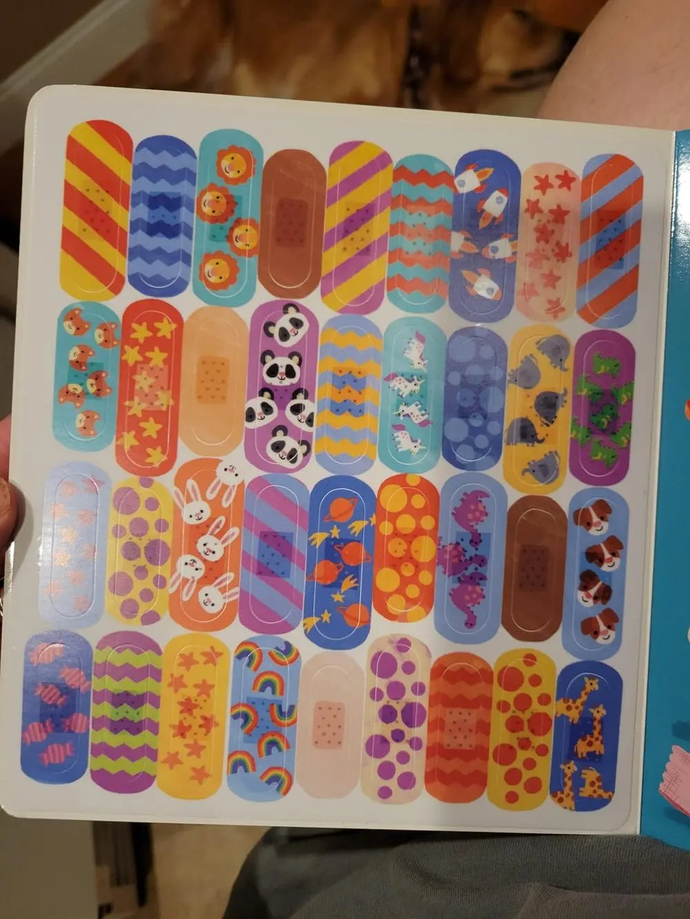 BowLift | The "Ouch Book" – Interactive Picture Book with 36 Reusable Band-Aid Stickers