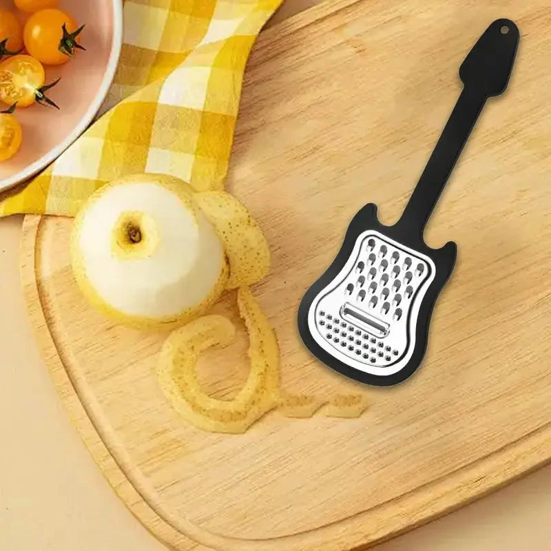 BowLift | Vegetable peeler made of stainless steel – Guitar-shaped peeler for peeling & slicing