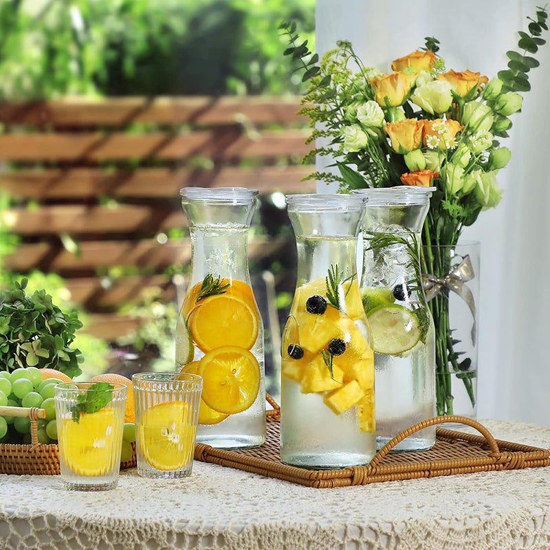 BowLift | Set of 4 Glass Carafe with Lid, 1 Liter Beverage Serveware Carafe Clear Glass Pitcher for Cold Water, Juice, Milk, Iced Tea, Lemonade