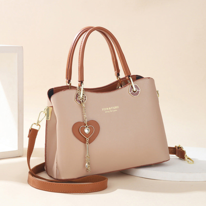 BowLift | Elegant women's handbag with sparkling heart pendant