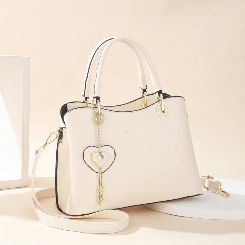 BowLift | Elegant women's handbag with sparkling heart pendant