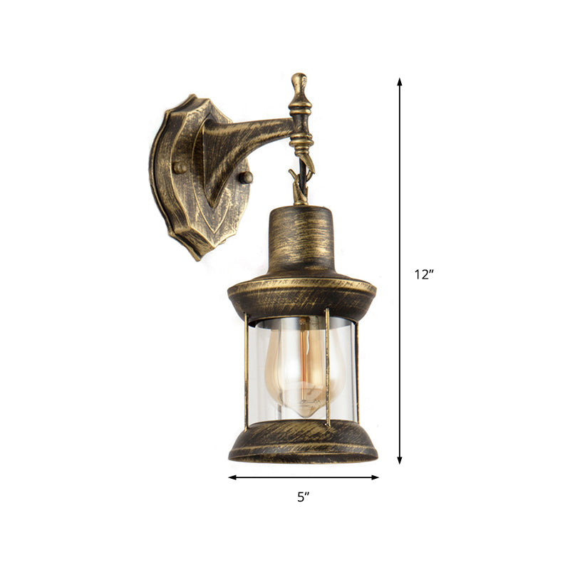 BowLift | An E27 wall light with a petroleum shade made of clear glass Traditional outdoor wall light in antique bronze