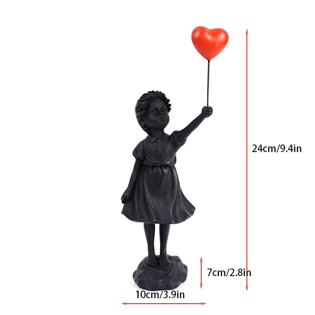Skulptur eines Mädchen mit Ballon im Banksy-Stil für Tischdekoration und kreative Wohnzimmerdekoration