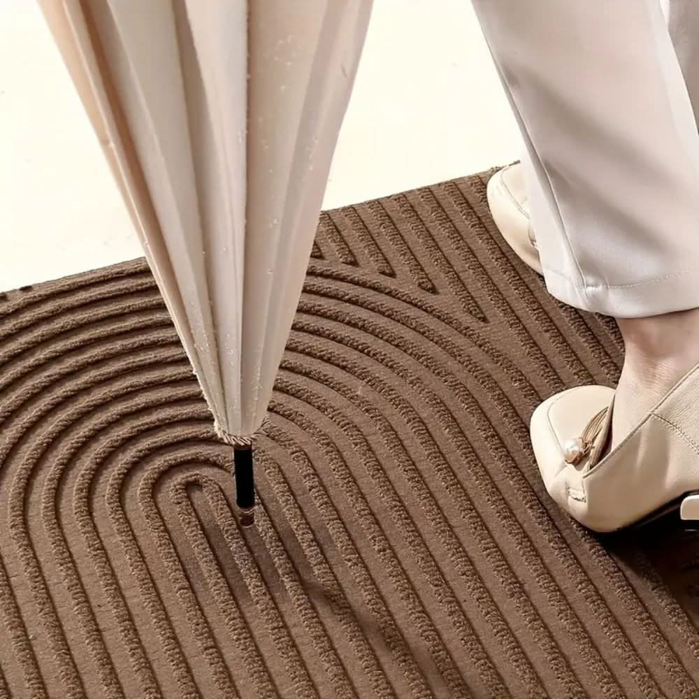 BowLift | Absorbent, washable mat with flowing line pattern