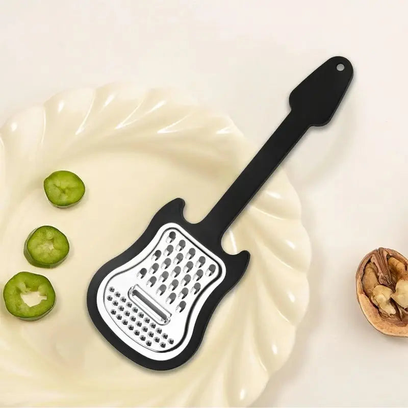 BowLift | Vegetable peeler made of stainless steel – Guitar-shaped peeler for peeling & slicing