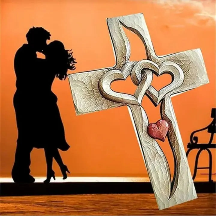 BowLift | Hand-carved wooden cross with intertwined hearts