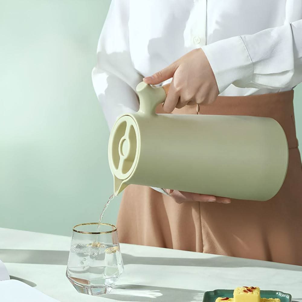 BowLift | Elegant double-walled glass carafe with wooden handle for hot and cold drinks