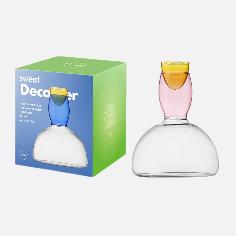 BowLift | Chalice and carafe made of colored glass by Phillips