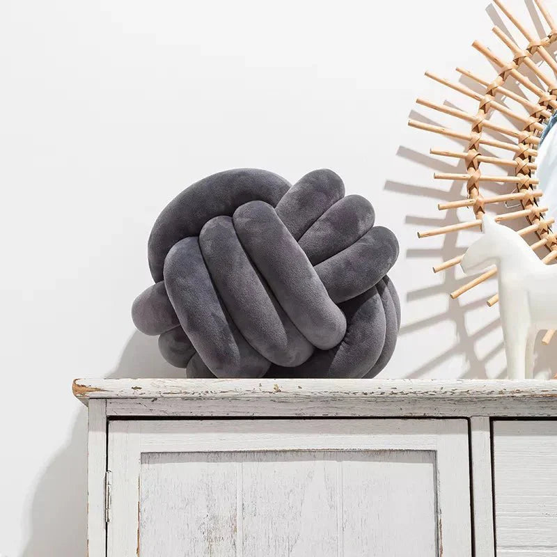 BowLift | Decorative, soft cushion with knotted ball in suede look