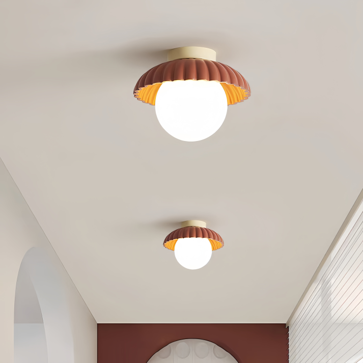 BowLift | Ceiling lamp with a milk glass shade providing warm lighting in the hallway